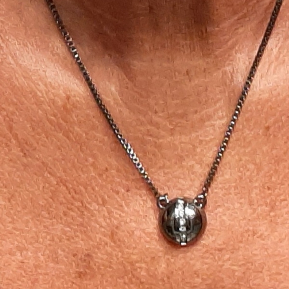 Black necklace w/a row a Swarovski crystals